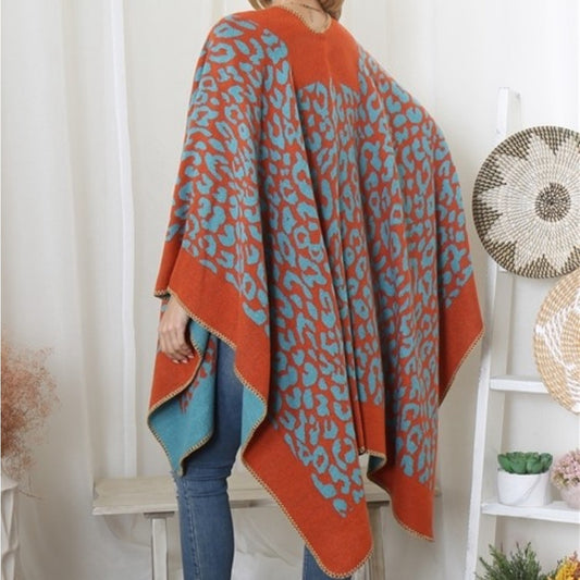 Women’s Leopard Print Ruana in Orange/Turquoise.